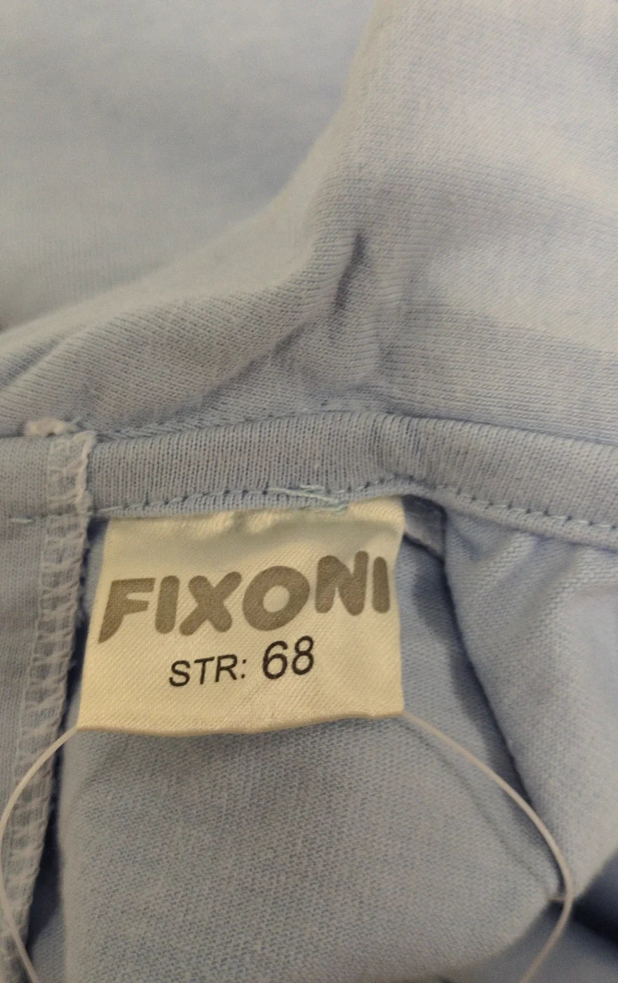Fixoni babyblå broderad tröja