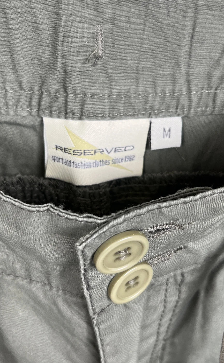 Reserved olivgröna vida byxor