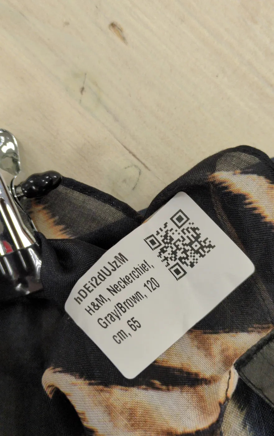 H&M Genomskinlig tunika med tigerprint