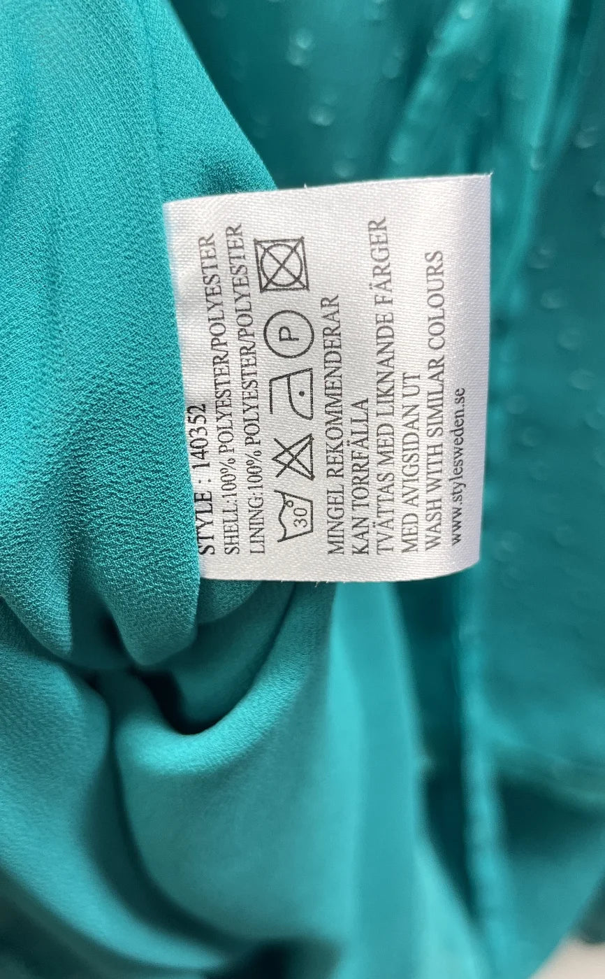 MINGEL ärmlös klänning i teal med lager