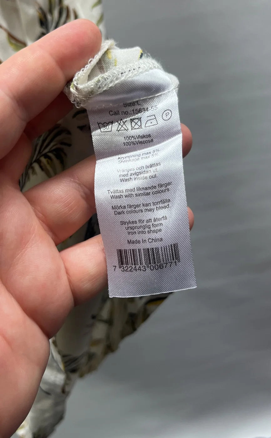 Pure Instinct linne med bladmönster