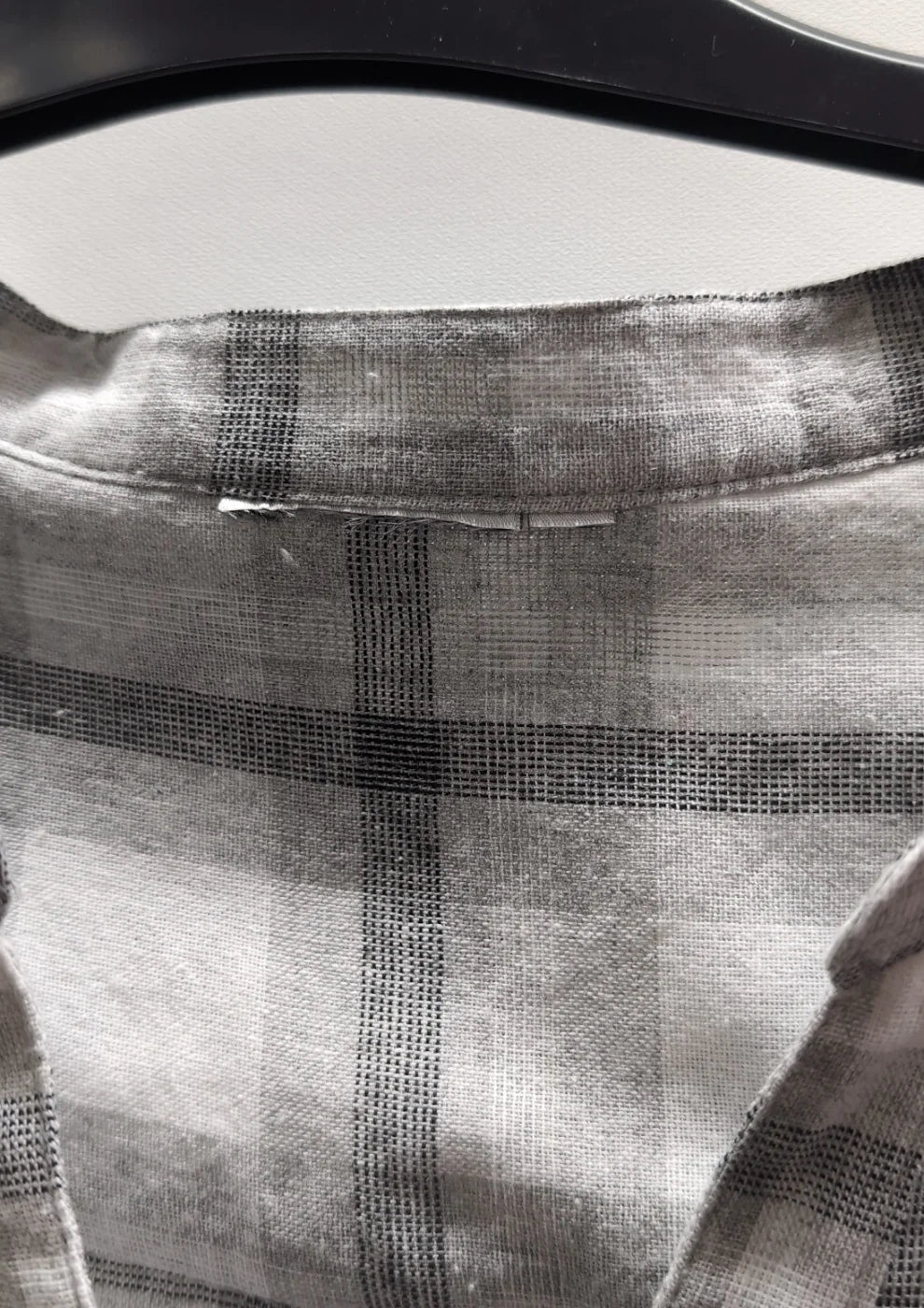 Rutigt blus med knäppning