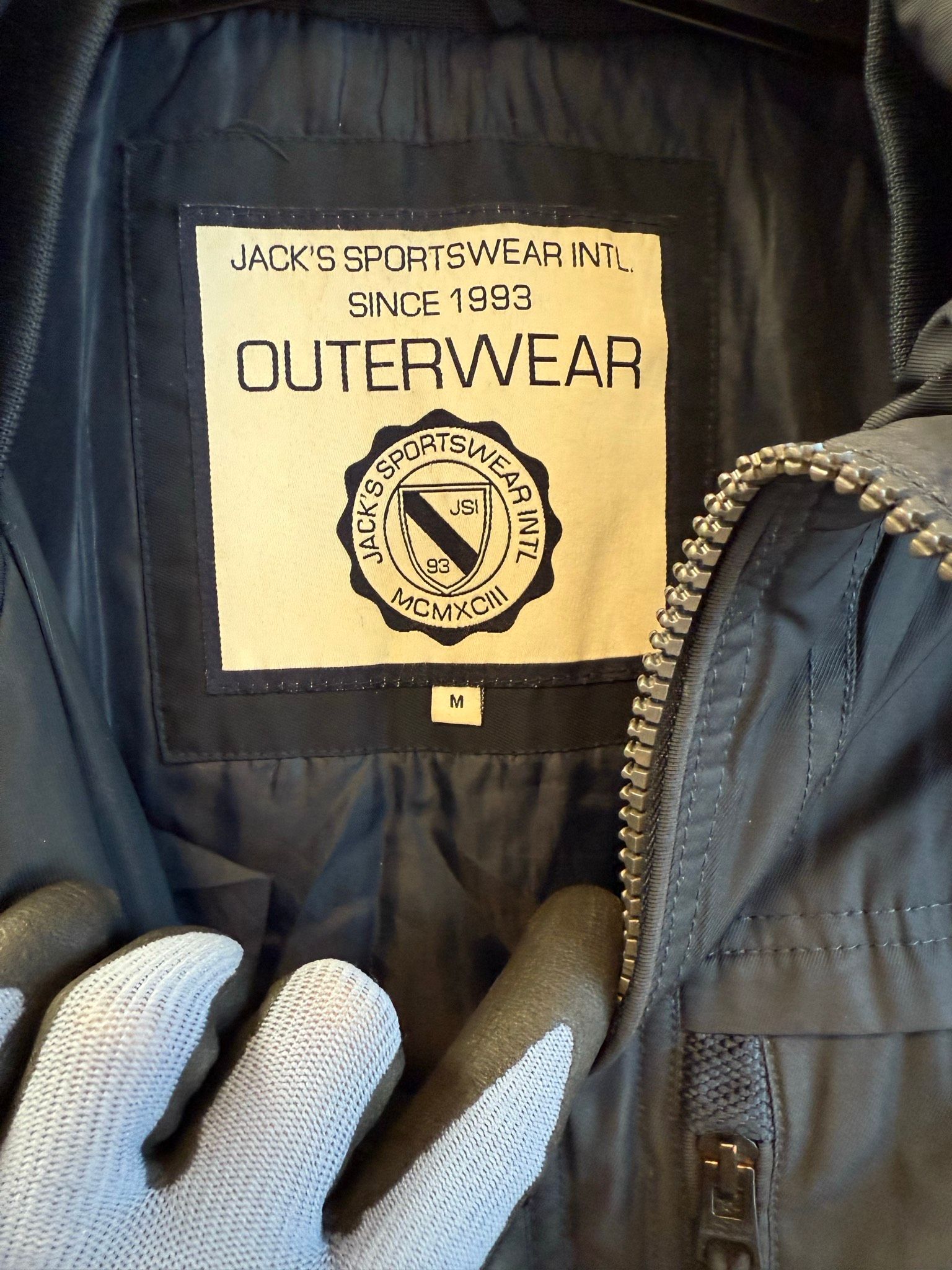 Jack's Sportswear Intl. marinblå jacka med dragkedja