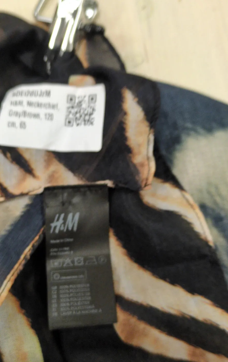 H&M Genomskinlig tunika med tigerprint