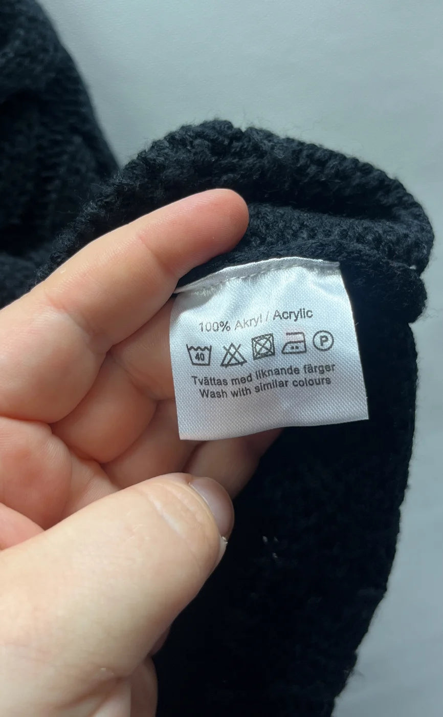 STORIES svart flätstickad tröja