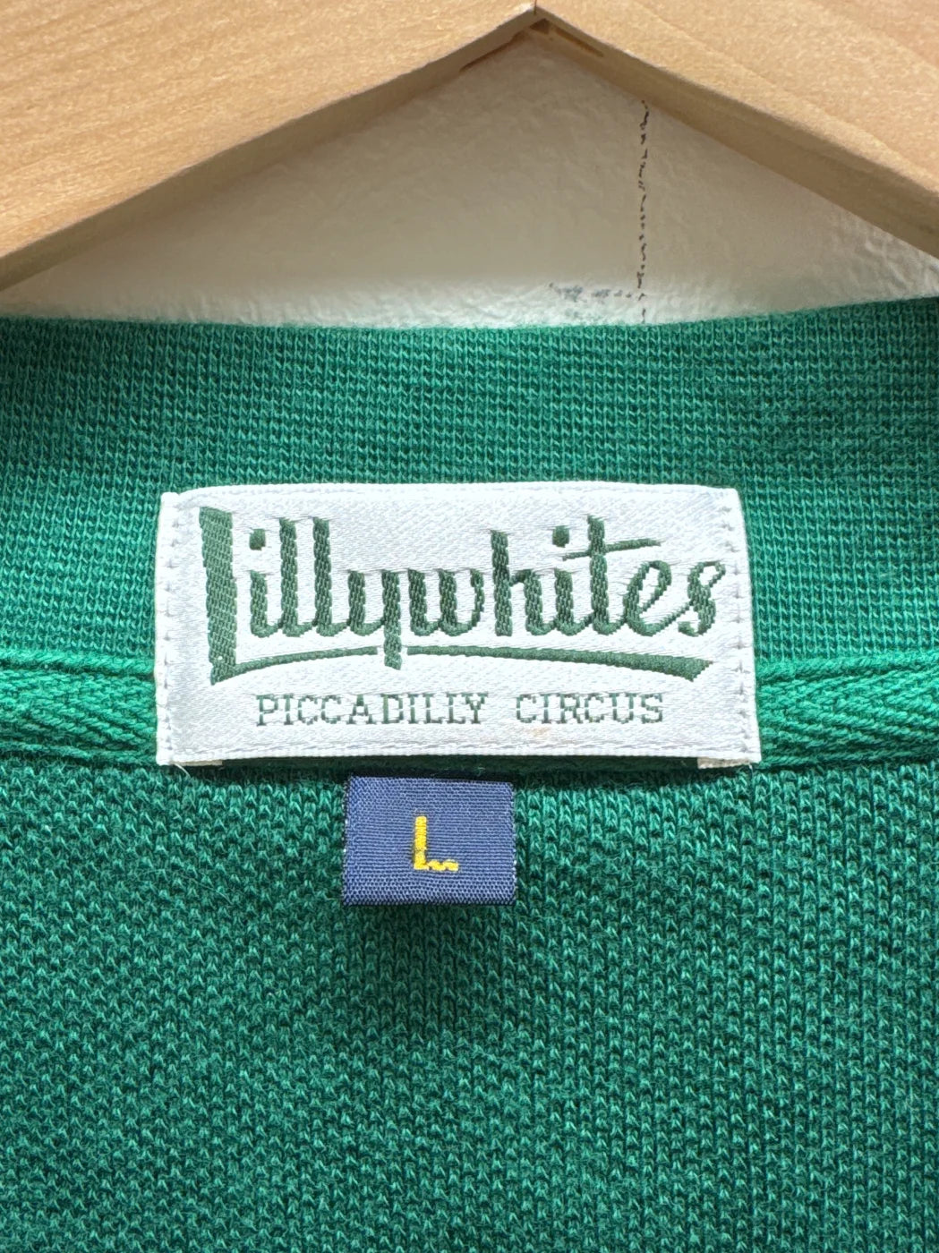Lillywhites grön väst med broderad emblem och v-ringning